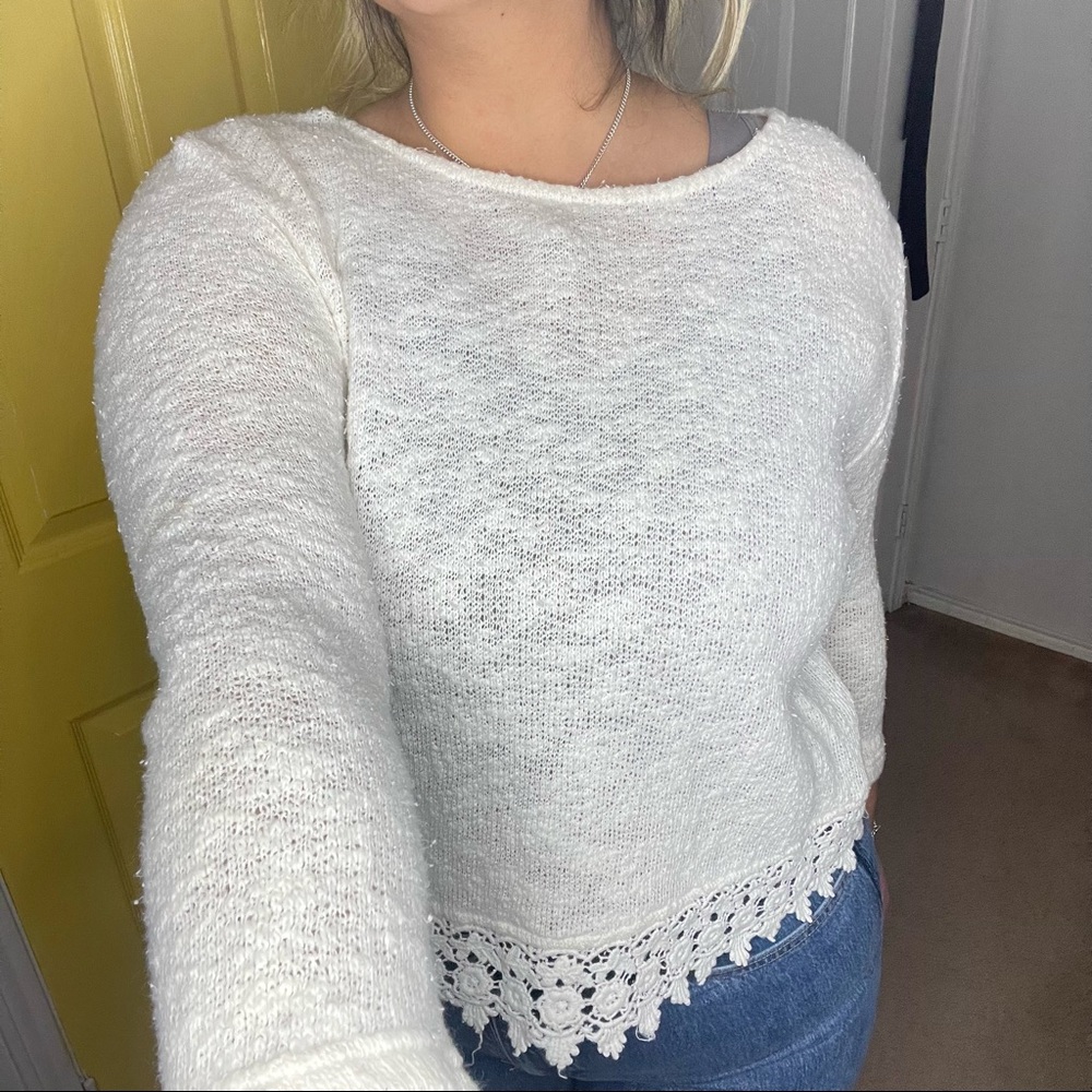 Pearl white sweater. Stretchy.